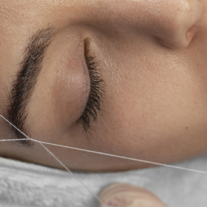 depilación con hilo